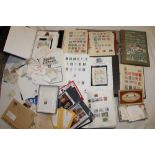 A box containing numerous albums of World stamps together with boxes of stamps, stamps in packets,