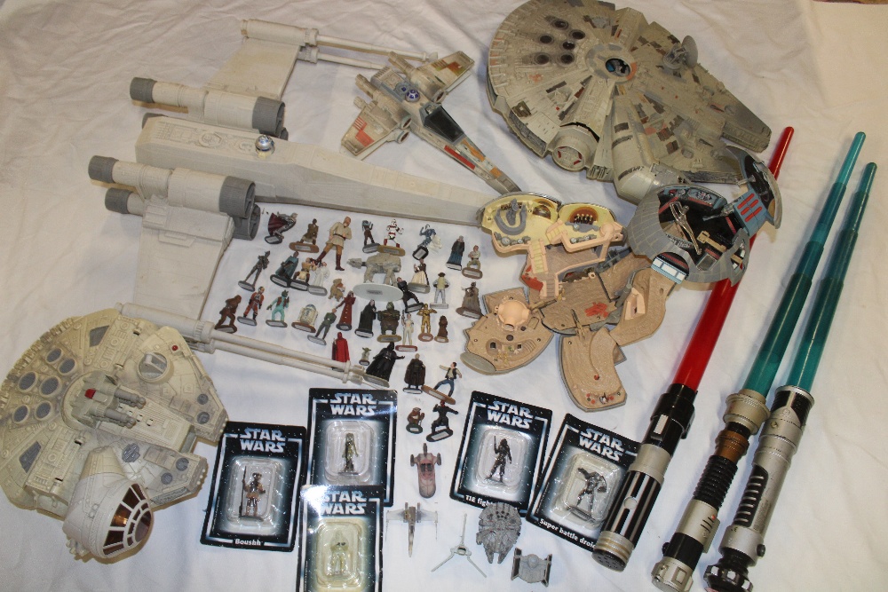 A selection of various Star Wars toys including five carded figures, various unboxed figures,