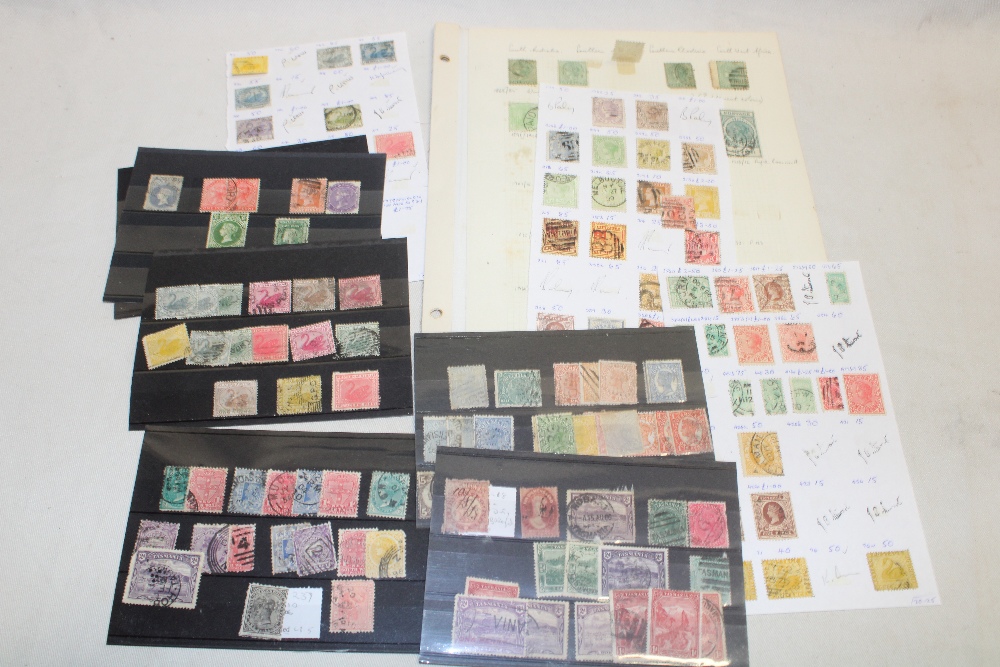 Various album pages and stock cards containing a selection of Australian States stamps,