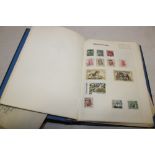 An album containing a selection of GB and World stamps