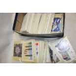 A box containing approximately 60 sets of mint PHQ cards and others,