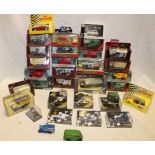 A selection of mint and boxed diecast vehicles including Dinky, Matchbox, Minichamps and others,