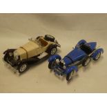 Two Burago 1:18 scale vintage racing cars