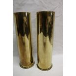 A pair of First War brass shell cases engraved "Yser 1914/Maison du Passeur 1915" 11" high