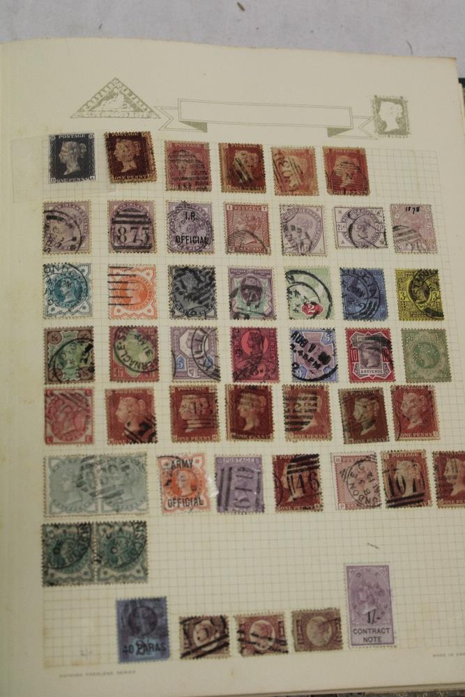 A folder album containing a collection of GB stamps including 1d black with red Maltese cross