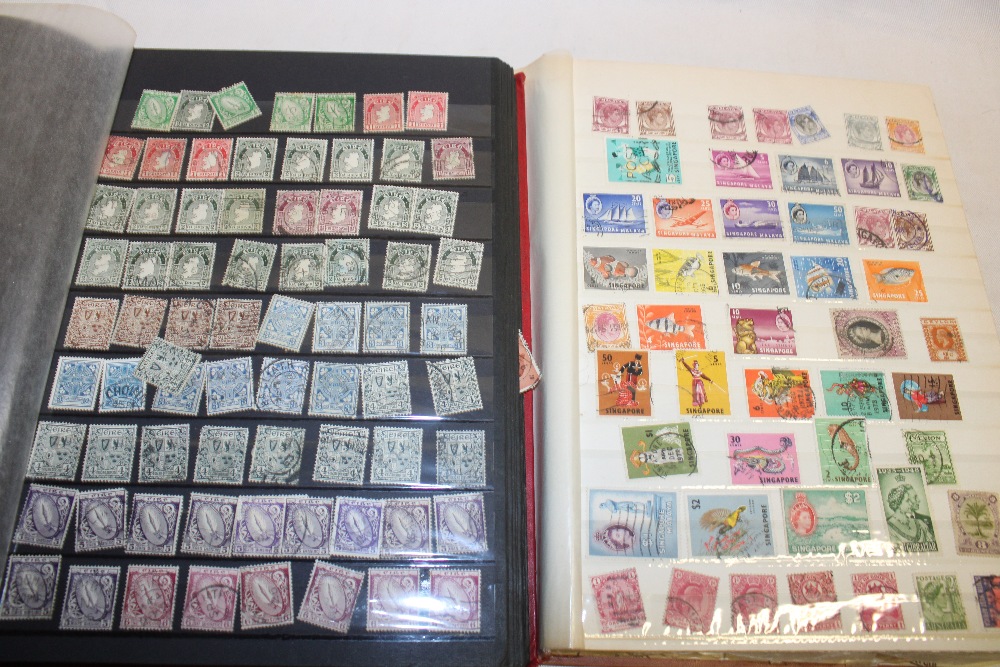 Two stock books containing a selection of British Commonwealth stamps