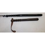 A turned wood Police truncheon,
