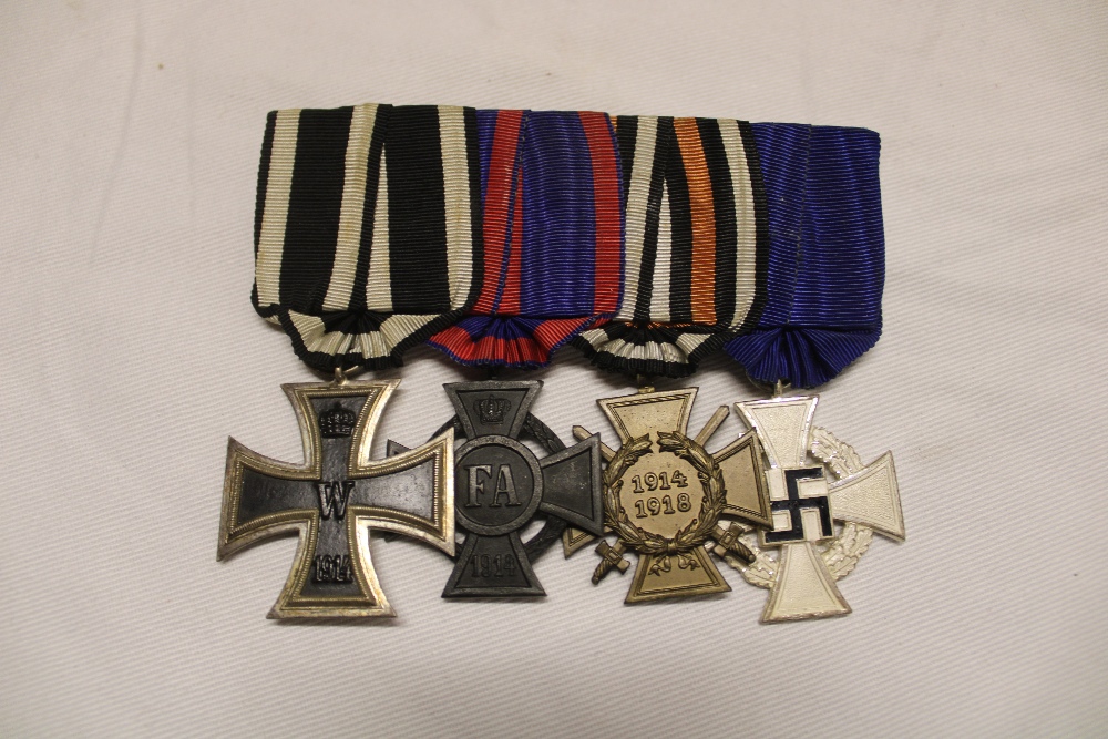 A group of four German First War medals including 1914 Iron Cross Second Class;