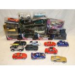 A selection of mint and boxed cars including three Corgi James Bond vehicles,