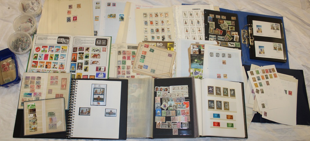 Various albums and album pages of mixed World stamps together with a small box of stamps etc.