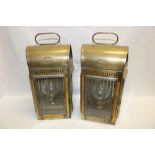 A pair of old brass arched ship's lamps by Davey & Co.