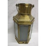 An old brass ship's lamp by Alderson & Gyde Ltd.