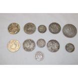 A George III 1820 silver crown, various half crowns including 1826, 1880, etc,