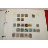A folder album containing a collection of India and Indian States stamps,