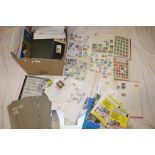 A box containing a large selection of albums of World stamps, catalogues, postal stationery,