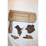 A wooden anti-gas rattle and a selection of various shrapnel pieces