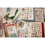 Various albums of mixed World stamps, stamps in packets, tins, PHQ cards etc.