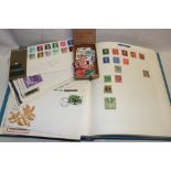 An album containing a selection of GB and Foreign stamps,