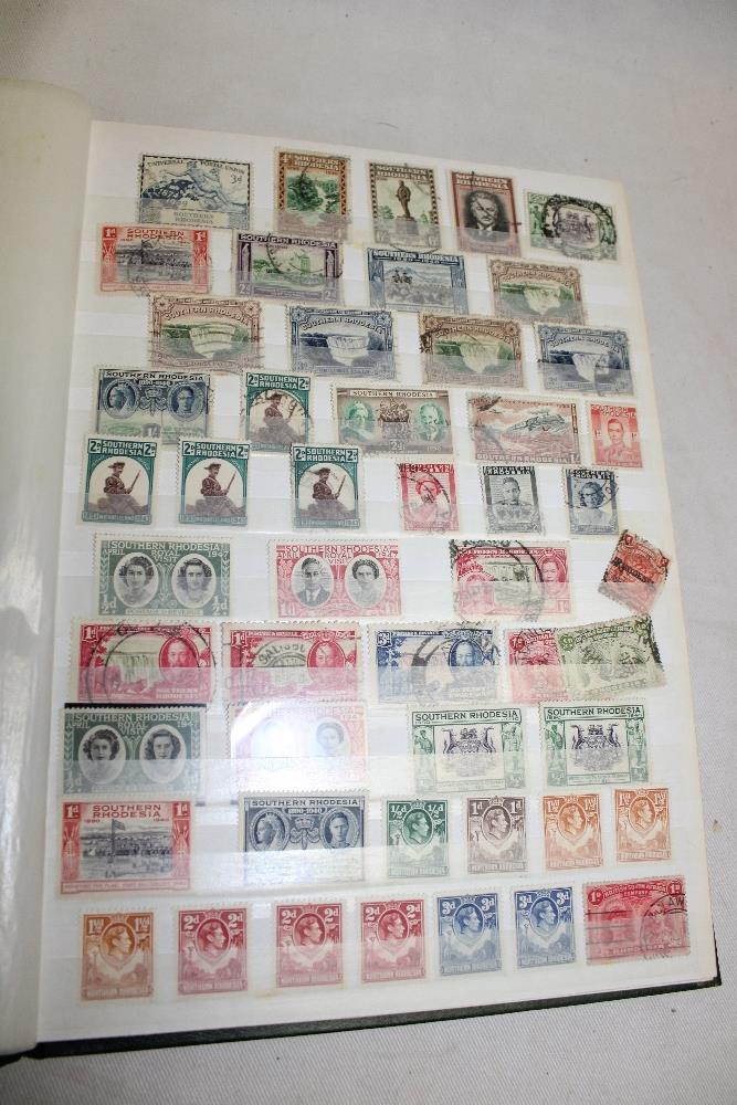 A stock books containing a collection of British Africa stamps including two Cape of Good Hope