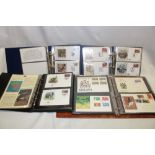 Three albums of GB first day covers and Benham silk covers and an album of World Wildlife Fund