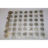 A selection of approximately 50 various pre-1947 silver shillings including some 19th century