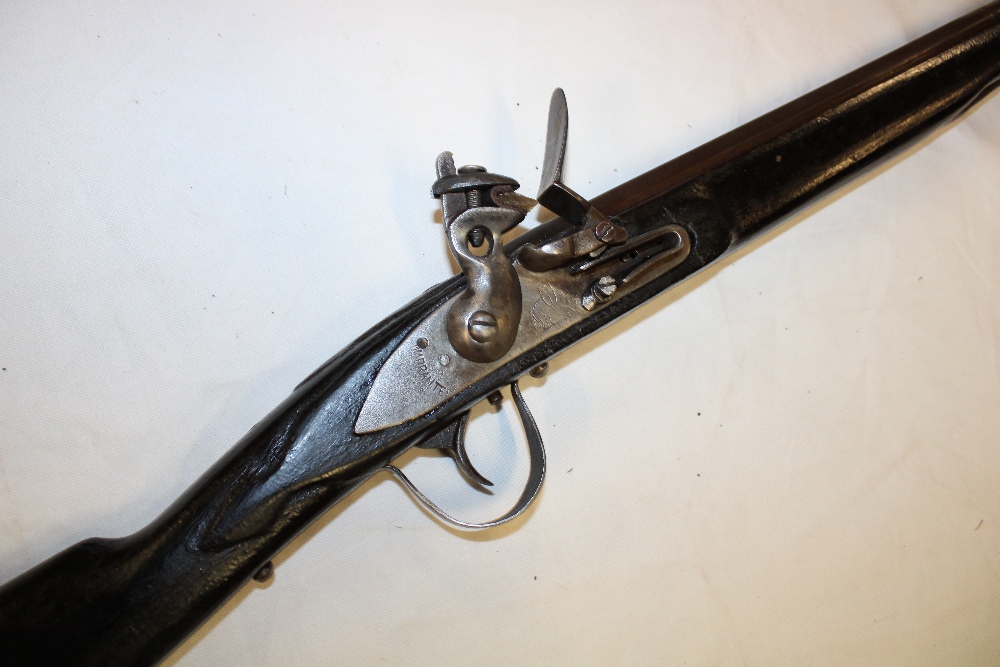 A 19th century flintlock trade gun with 44½" steel barrel, - Image 2 of 4