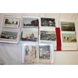 Four small albums of various black and white and coloured postcards - topographical scenes,