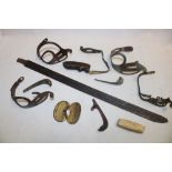 A selection of various sword guards and hilt fittings, part sword blade etc.