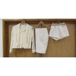 An Elsie Whiteley cream blouse with self tie neck,