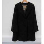 A "Lister" high pile black astrakchan 3/4 length jacket