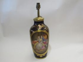 A Victorian Continental porcelain hand-painted vase lamp