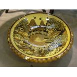 A Harleston Pottery bowl with Oriental bridge design,