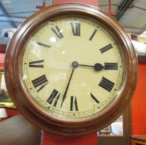 An early 20th Century walnut framed slave dial clock with quartz mechanism,