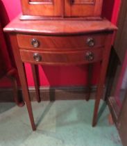 A George III revival line inlaid mahogany bow front table of small proportions the two drawers over