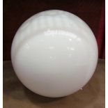 A milk glass globular shade,