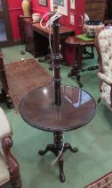 A 19th Century mahogany wine table/lamp standard (converted to electric).