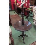 A 19th Century mahogany wine table/lamp standard (converted to electric).