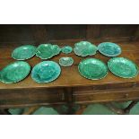 Ten assorted green plates including Wedgwood