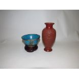 A Chinese tea bowl, blue glazed ceramic body with metal dragon design, character marks to base,