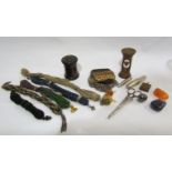 A mixed lot to include a rosewood treen pot, two travel corkscrew, a wooden egg timer,