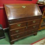 A mid 18th Century oak bureau, two short over two long drawers,