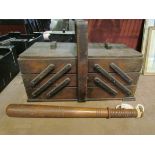 A turned wooden truncheon and a cantilever sewing box (2)