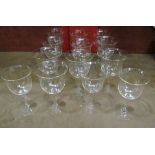 A selection of clear glass wine goblets of differing sizes (13)