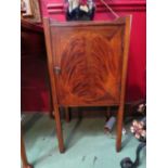 An Edwardian crossbanded flame mahogany night stand with raised gallery over fret handles and