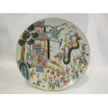 An early 20th Century Oriental polychrome charger, ceremonial scene,