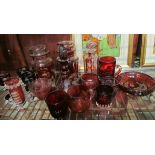 A cranberry glass collection to include scent bottles, glasses,