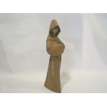 A Lladro matt figure of a monk,