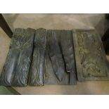 A quantity of carved wood panels including figural together with a lignum vitae policeman's