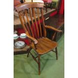 A Victorian elm seated slat back grandfather chair