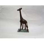 A model giraffe on marble base 28cm tall